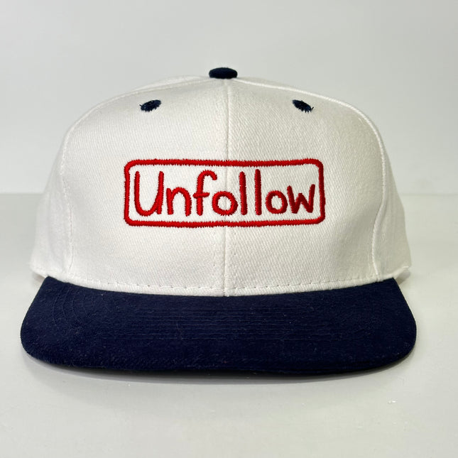 Unfollow on a white and navy Strapback hat cap Custom Embroidery